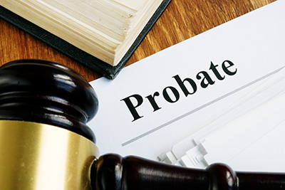 Probate sign, stack of papers and gavel.